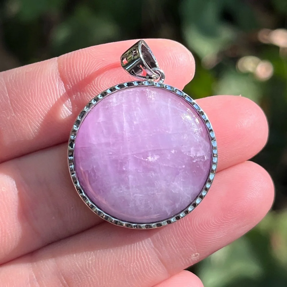 Silver plated round flashy kunzite pendant